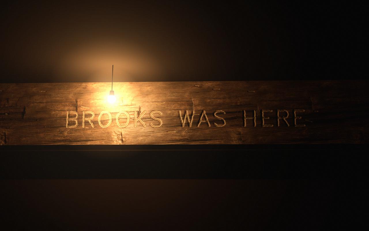 A weathered wooden beam under one bare bulb. Carved into it: BROOKS WAS HERE.